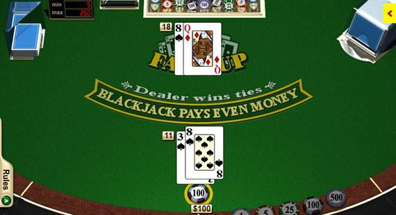 Blackjack table with a dealer and player cards