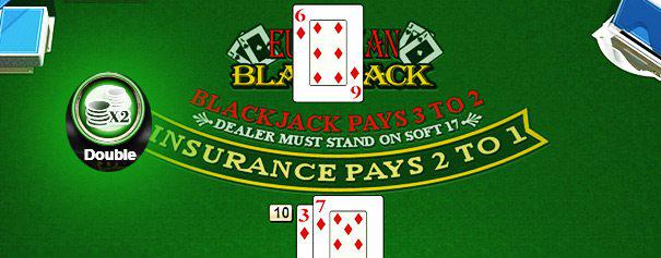 two player's cards on a blackjack table against the dealer's six