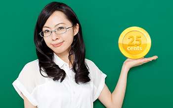 young woman in glasses holding gold coin