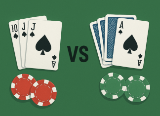 Playing cards and chips on a green surface