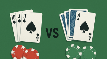 Playing cards and chips on a green surface
